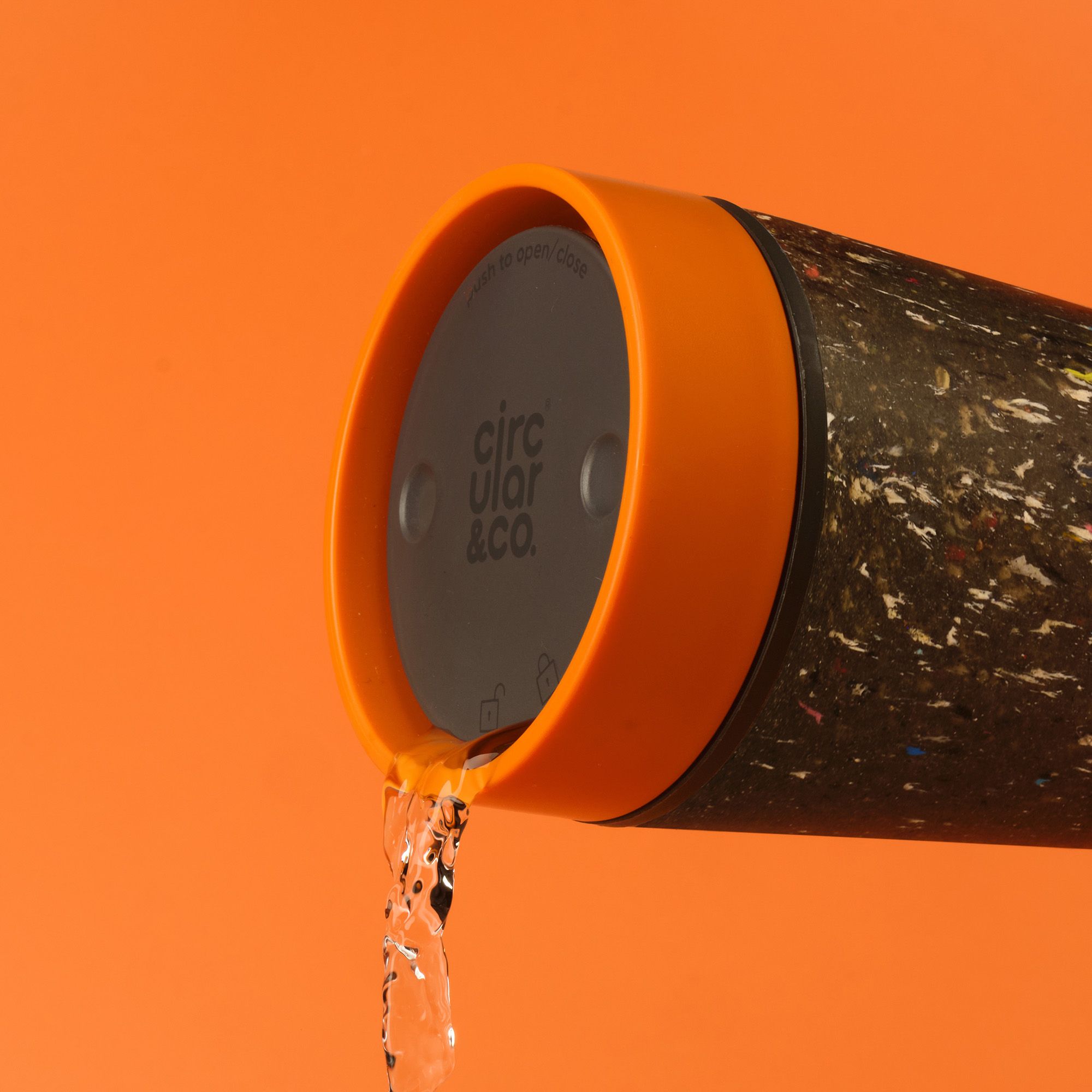 Circular&Co Website_Trainers_Reusable Cup_Sunrise Orange_2 Circular&Co Reusable Coffee Cup Made From Recycled Trainers Sunrise Orange 360 Drinking